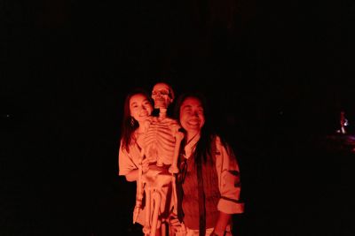 Three students in costume near the Mausoleum