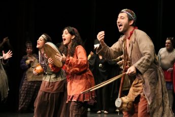 Actors on stage performing traditional Iranian play Tarabnameh