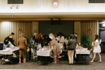 Students crowding a candy buffet at Tresidder