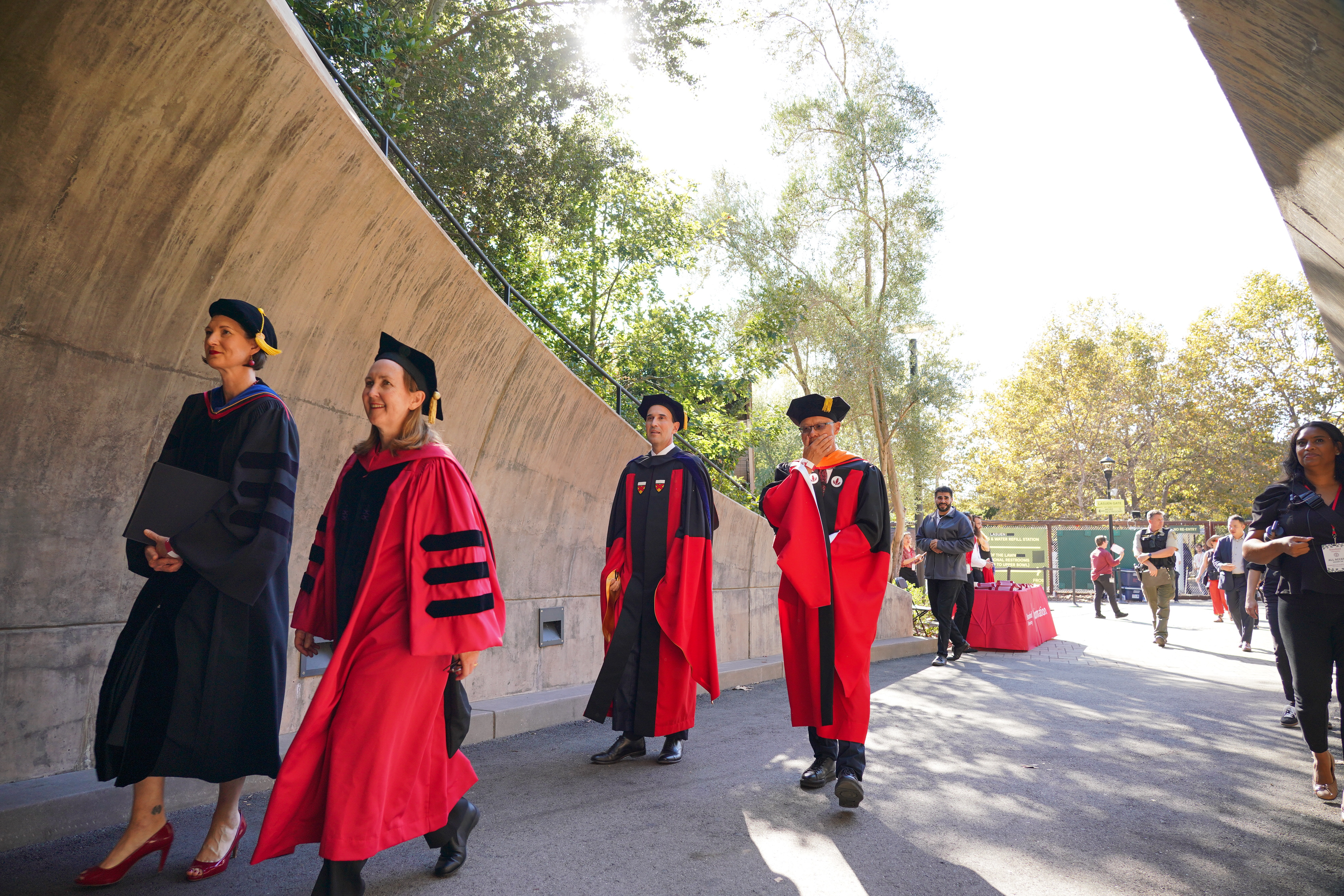 Jon Levin processes into the ceremony in Frost Amphitheater