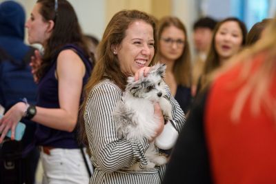 Samantha Churovich of Champaign-Urbana, Illinois, brought along her puppy, Teddy.