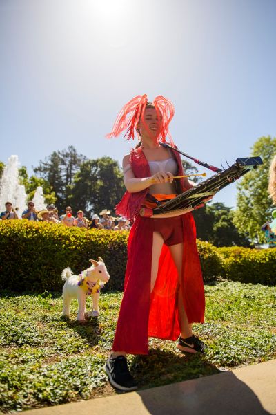 A member of the Leland Stanford, Jr. University Marching Band adds glockenspiel to the musical melée.