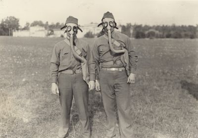 students wearing gas masks