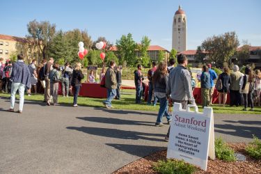 students walking toward activity fair on Meyer Green