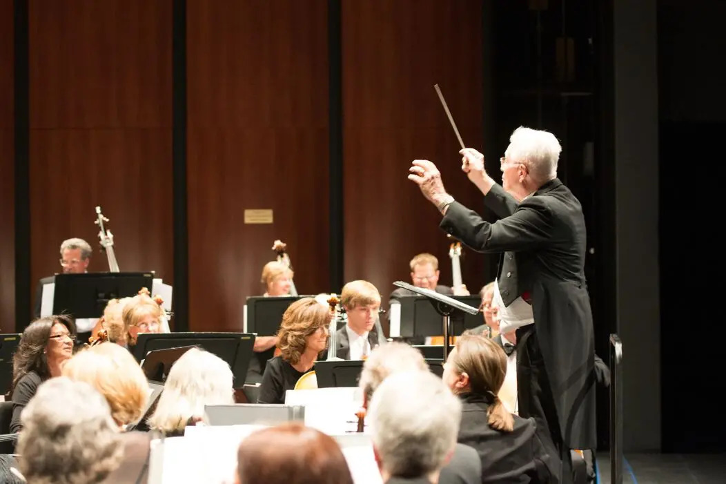 Arthur Barnes conducts members of the Livermore-Amador Symphony at his final concert after fifty years as music director and conductor of the group.