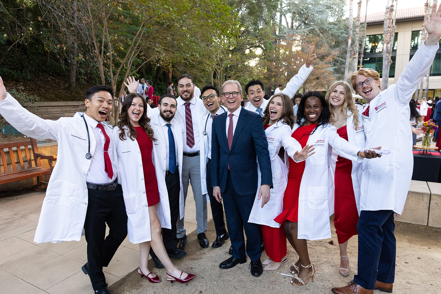 MD students celebrate with Stanford Medicine Dean Lloyd Minor.