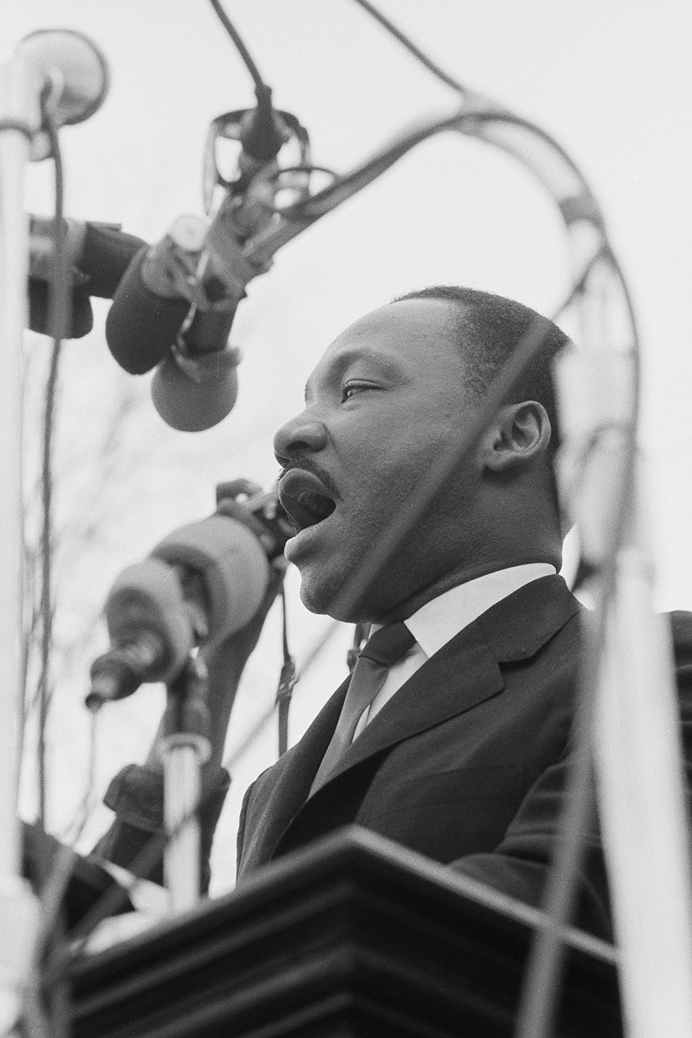 Closeup of Martin Luther King Jr. speaking in front of the Alabama State Capitol at the conclusion of the march.