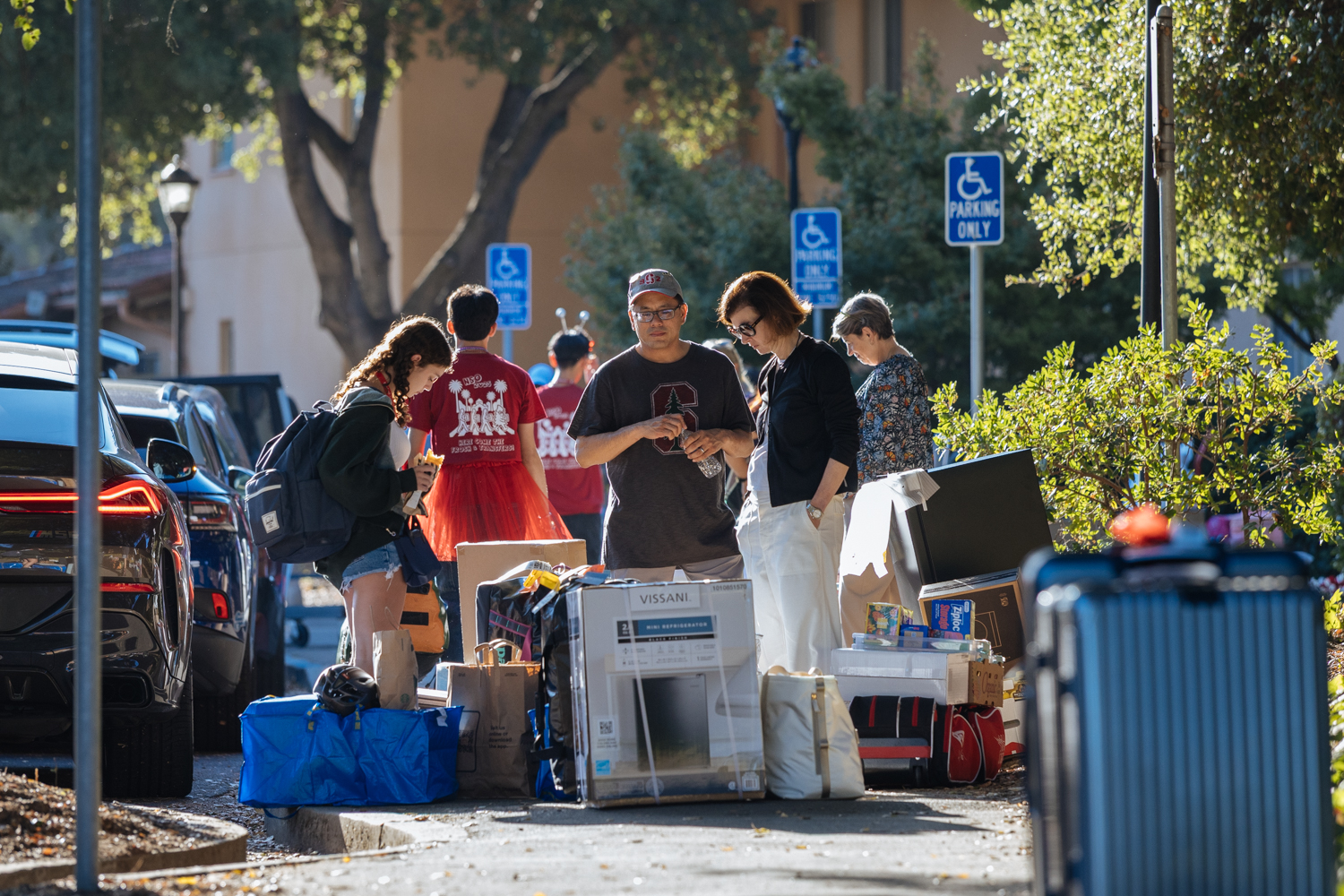 Families help their students move into the dorms.