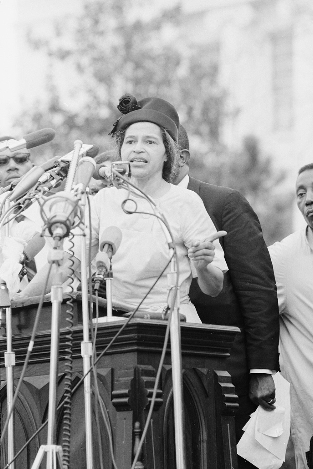 Rosa Parks speaks in front of the Alabama State Capitol.