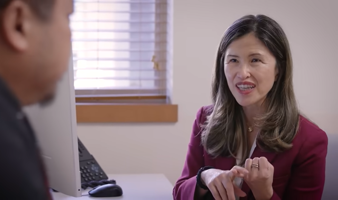 Endocrinologist Sun Kim talking with a patient about GLP-1s