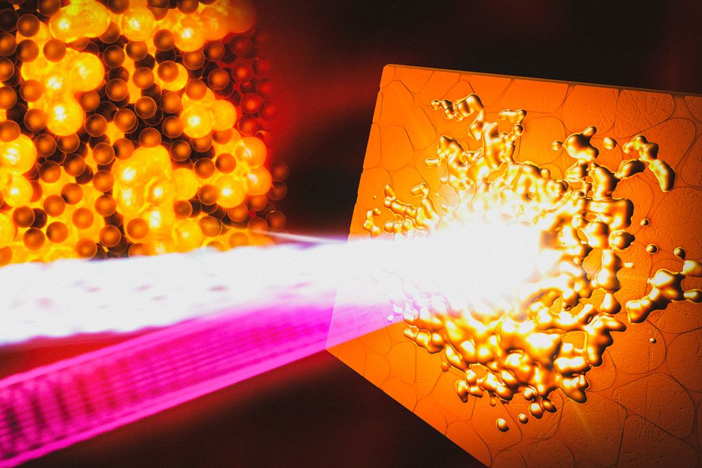 Artist's illustration of a bright laser beam striking a copper surface and melting it into glowing droplets, beside a cluster of atoms.