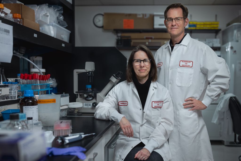 Justin and Erica Sonnenberg pose for a profile shot in their lab.