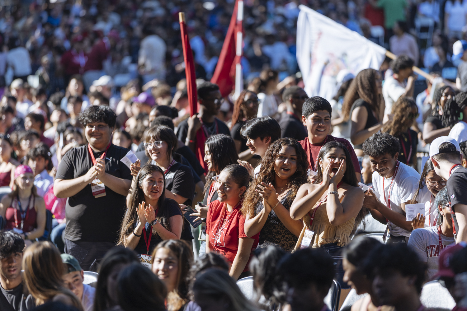 Wide shot of students in the audience.