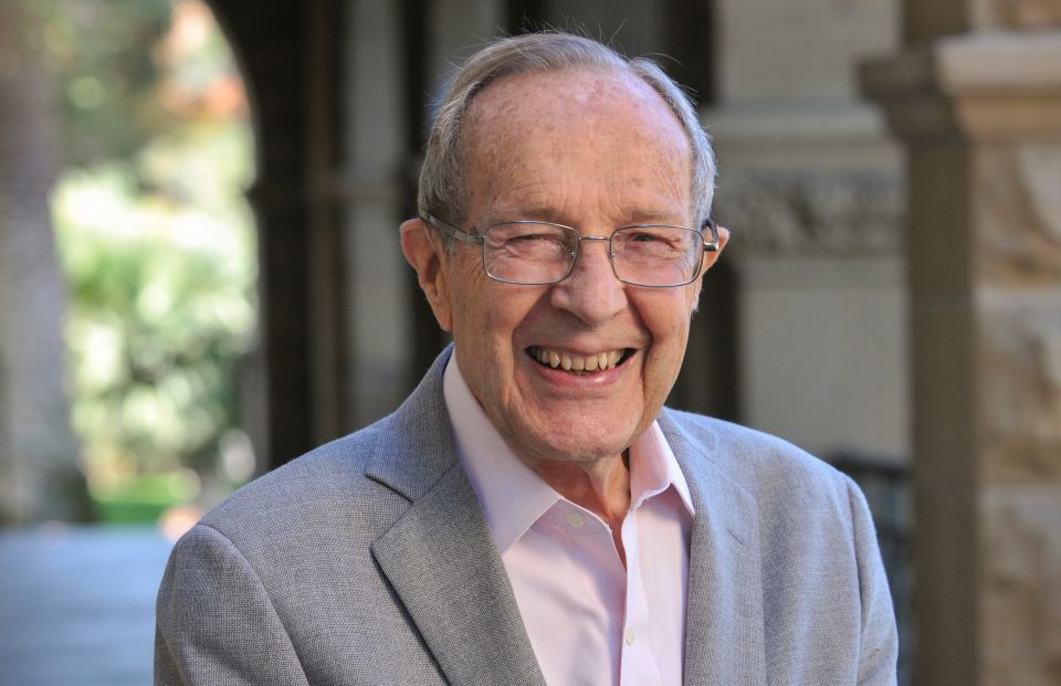 portrait of William Perry in Stanford arcade