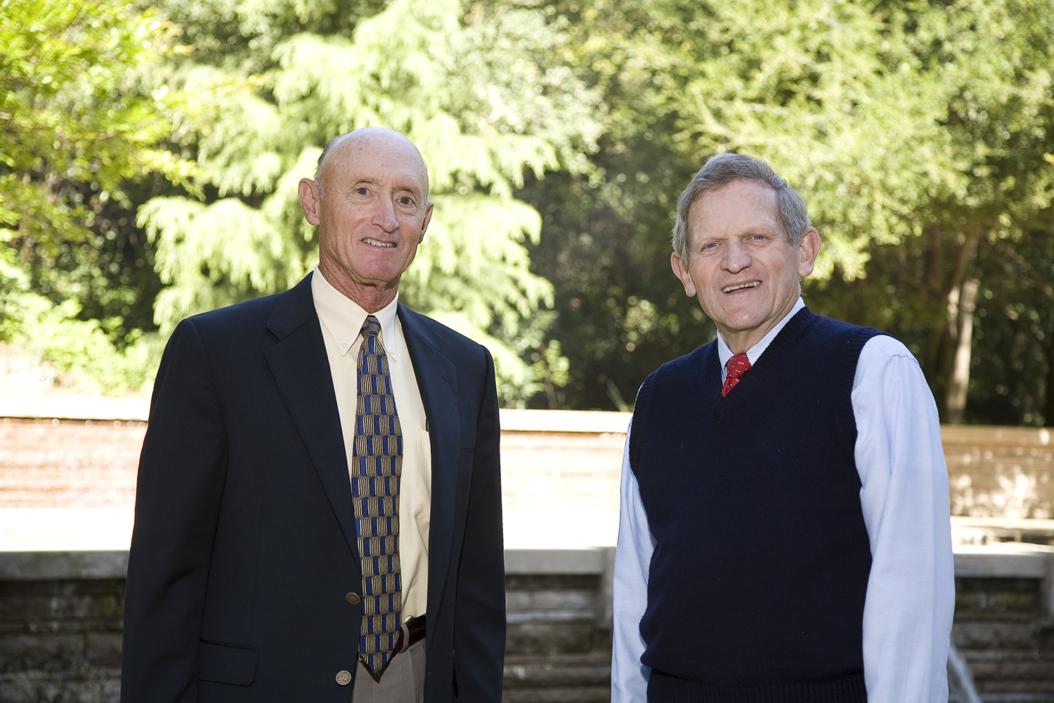 Image of Charles Holloway and  John Morgridge posing for a photo together.