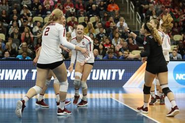 Women volleyball players celebrating