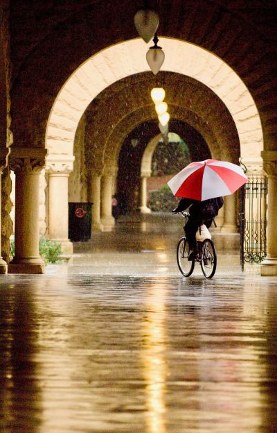 Bicyclist with umbrella