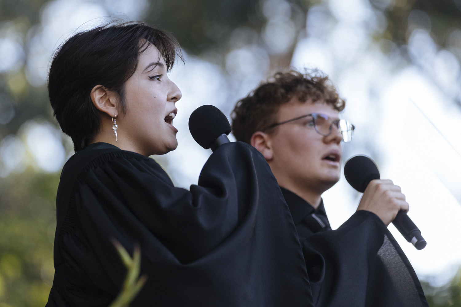 Student soloists Clarissa Daniel and Garrett Davidson sing the Stanford Hymn.