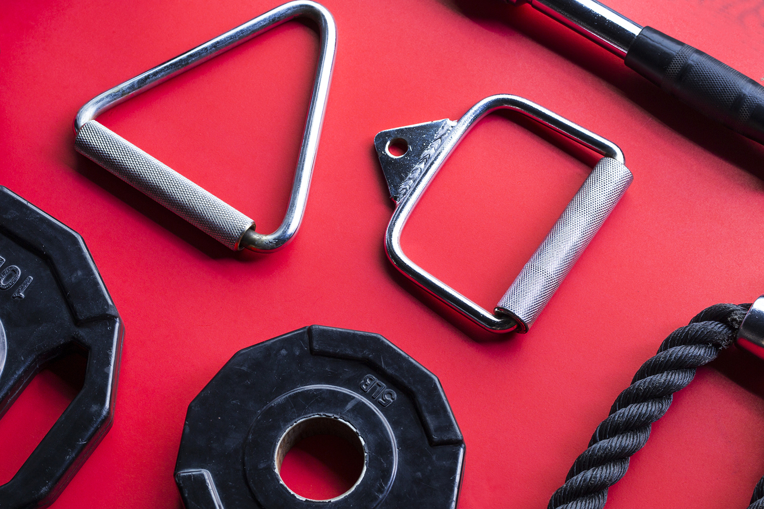 Image of a variety of exercise equipment and weights.