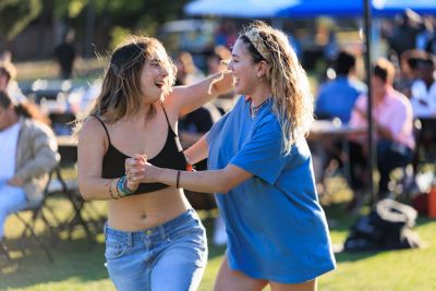 Two students dancing.