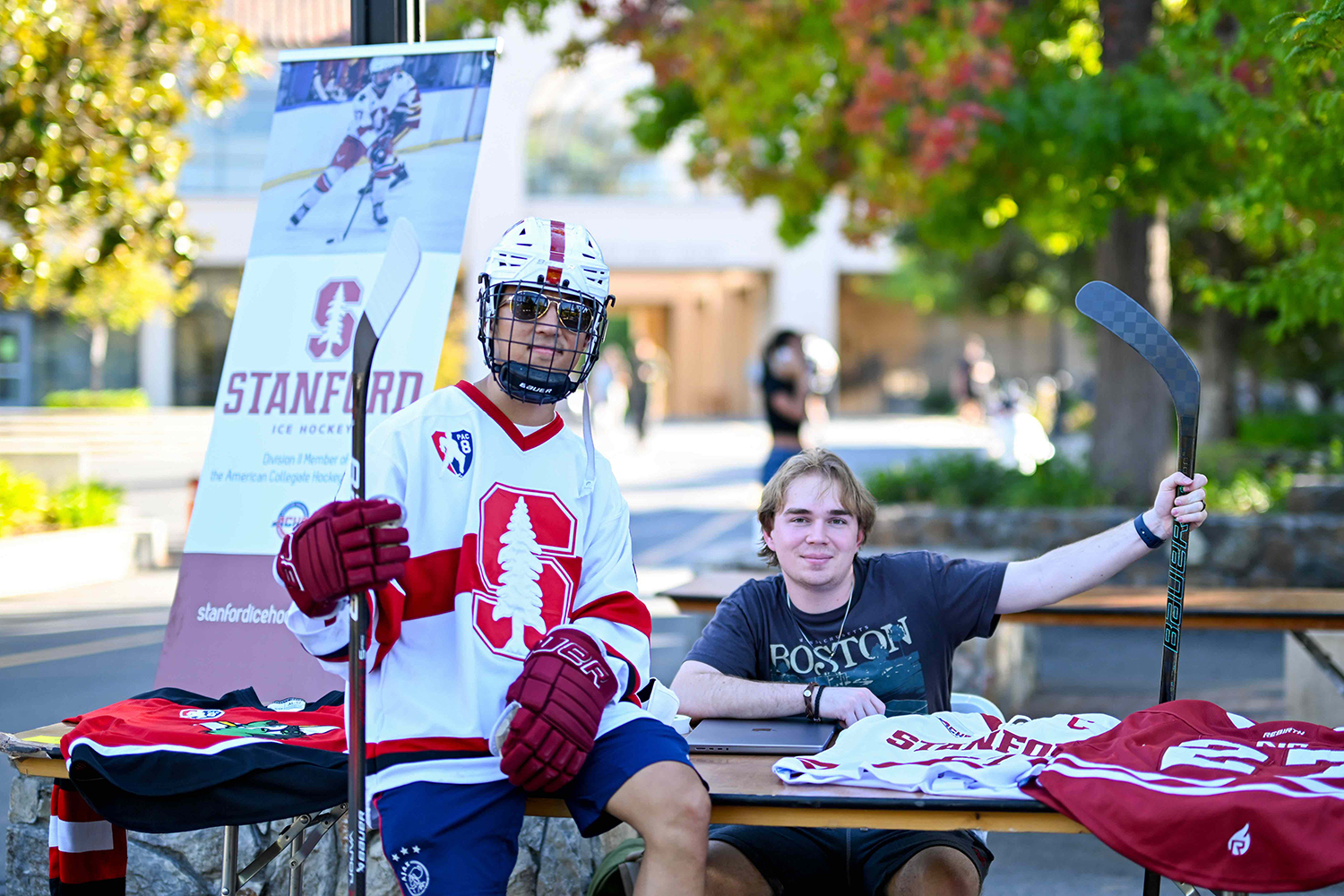 Students at ice hockey table