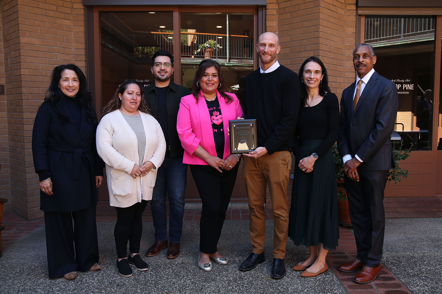 Pictured are members of the Ayudando Latinos a Soñar and the Stanford Immigrant Child Health Program after receiving the Community Partnership Award.