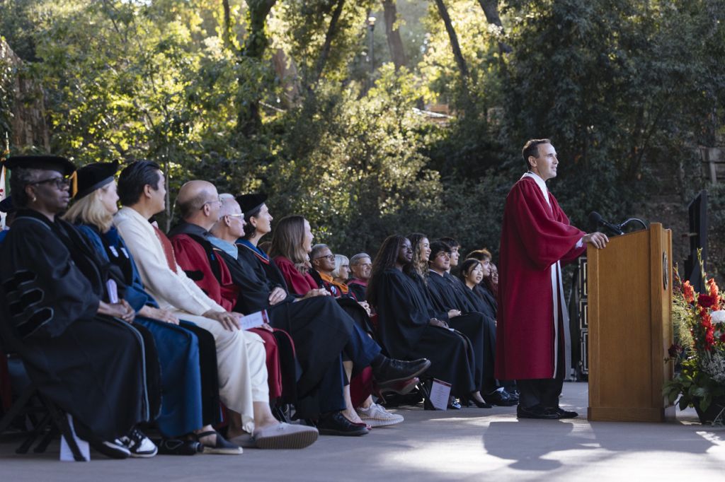 President Levin at lectern delivers remarks at 2025 Convocation
