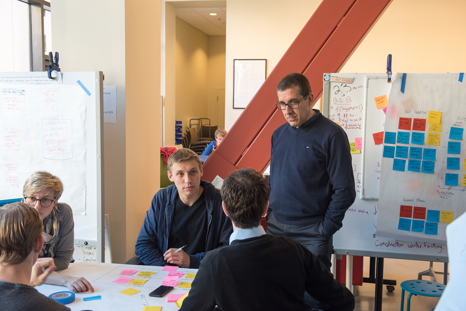 Image of students attending the hands-on Startup Garage course.