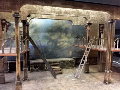 Set of production of Shakespeare’s The Tempest: abandoned Jacobean theater updated with a stage-within-a-stage.