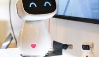 A cute robot with a heart on its belly.