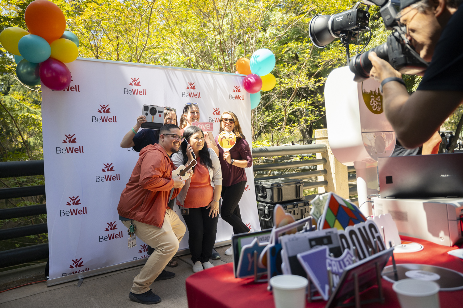 Attendees pose at the photo booth.