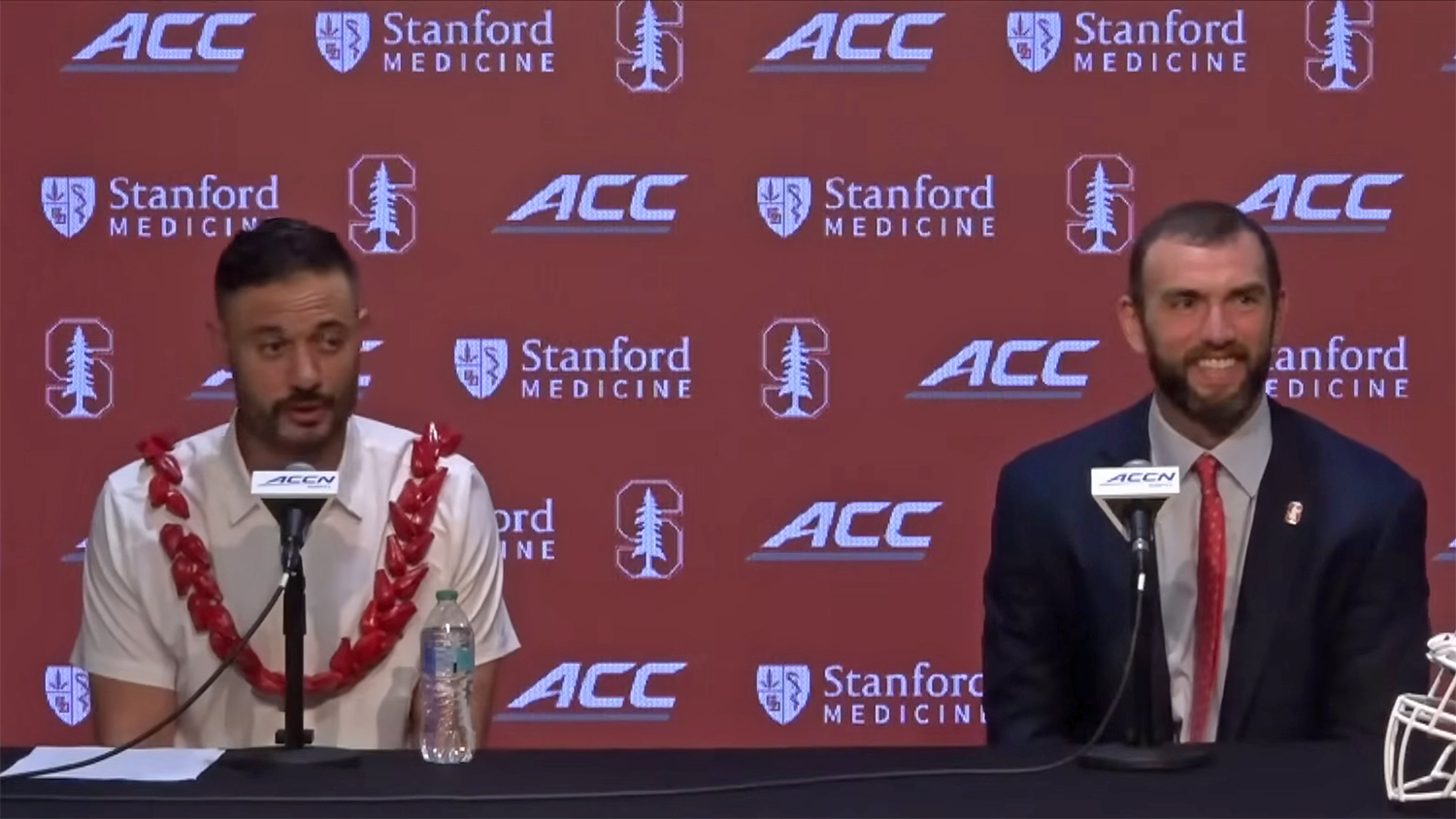 Image of Tavita Pritchard and Andrew Luck during the Stanford football introductory press conference.