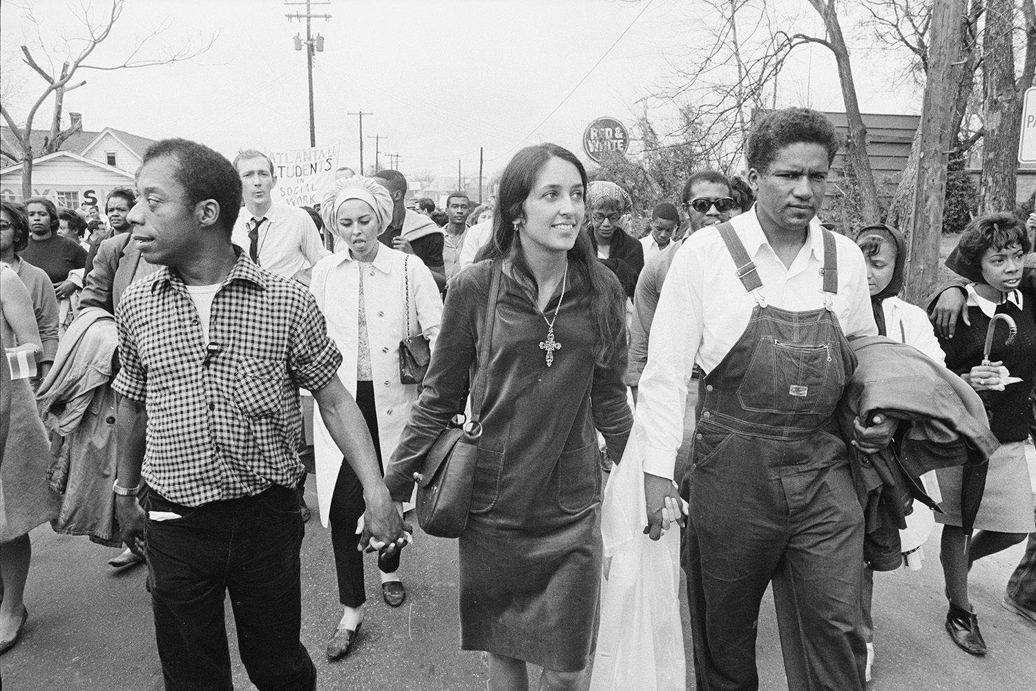James Baldwin, Joan Baez, and James Forman participate in march from Selma to Montgomery, Alabama.