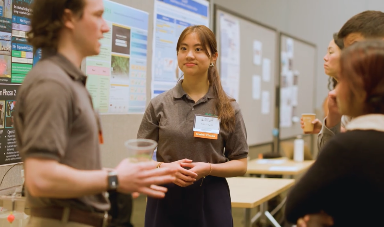 Open video A student presents her solution at the Global Sustainability Challenge in a modal