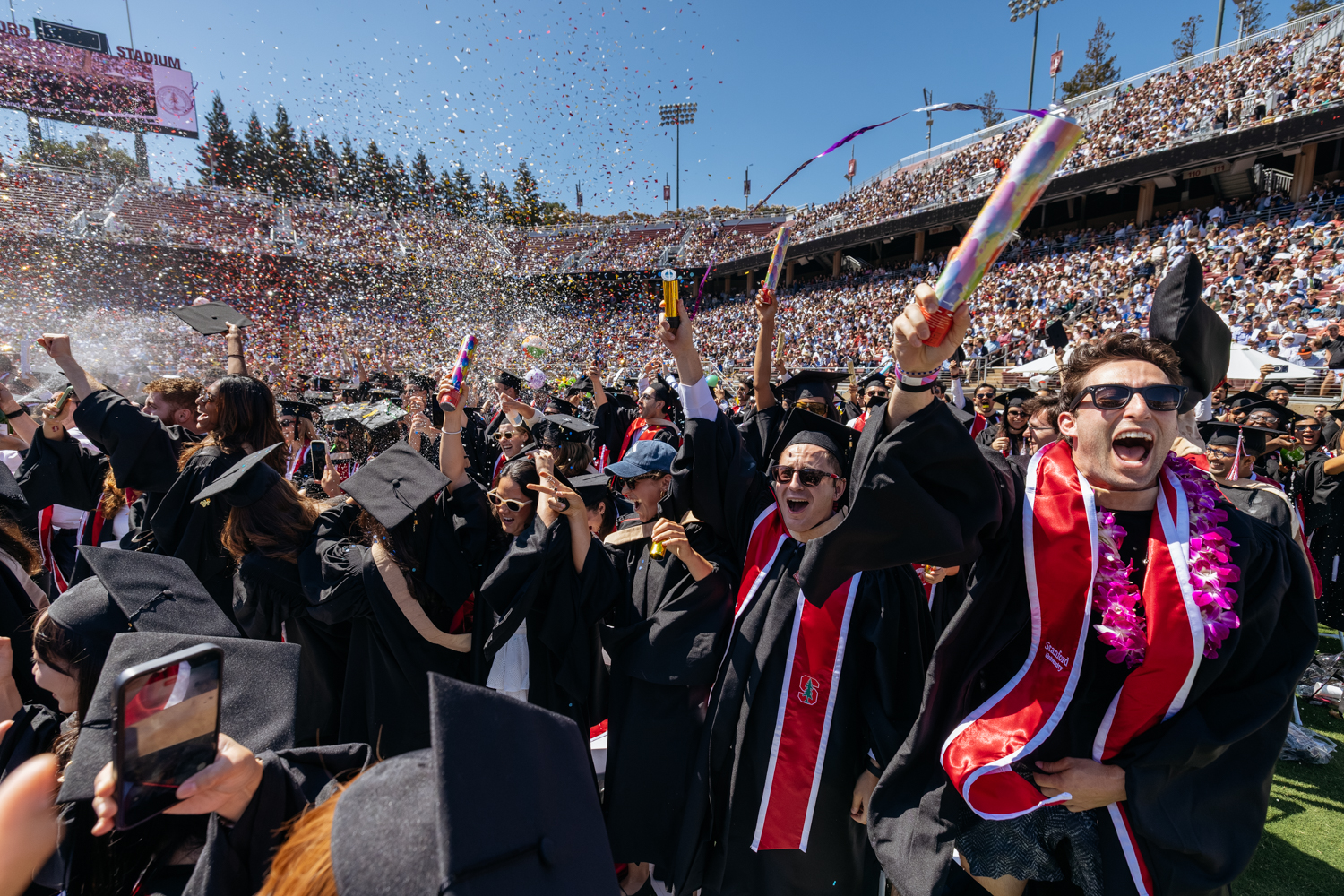 Graduates celebrate in a sea of confetti at Commencement 2026