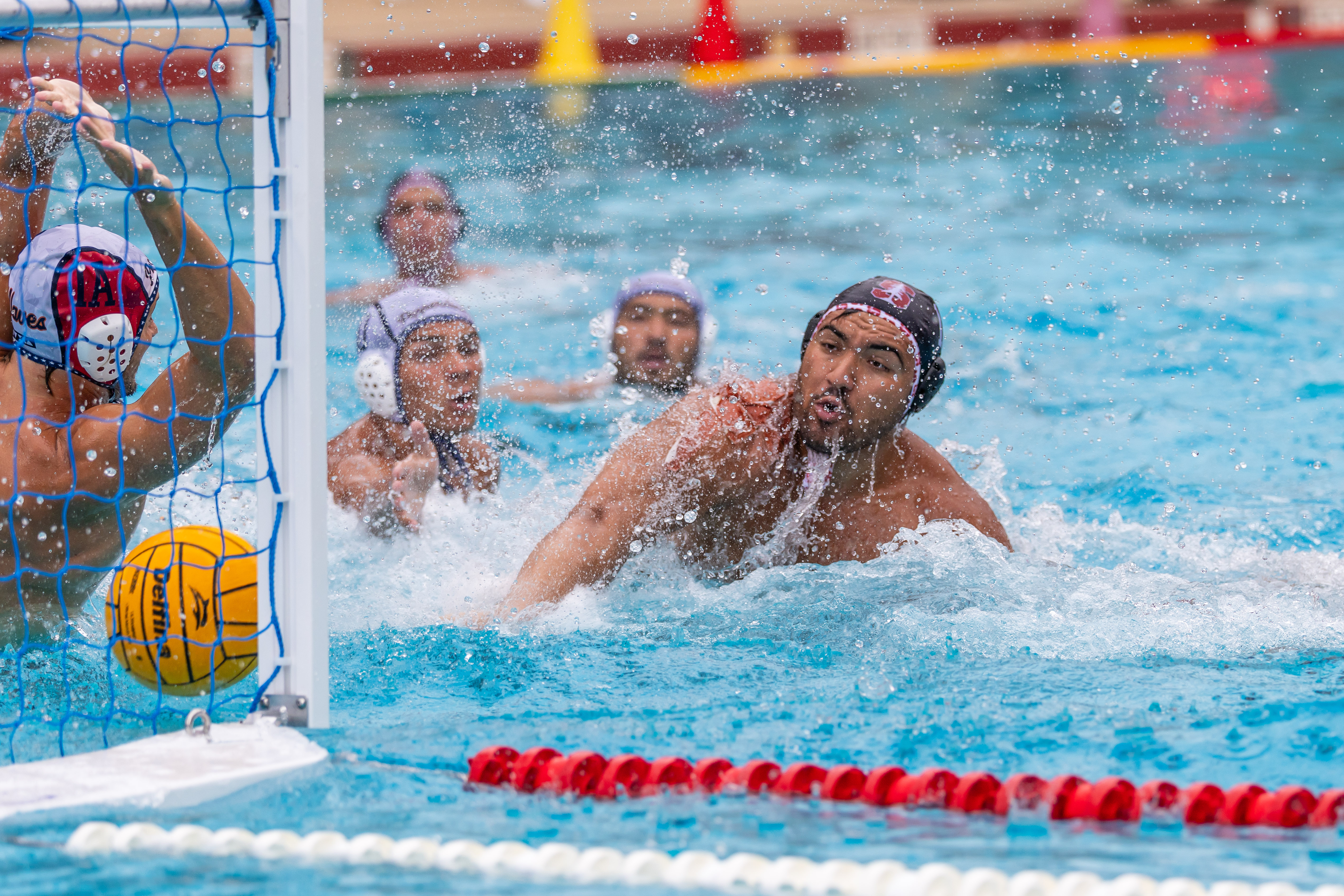Alex Gheorge playing water polo at Stanford