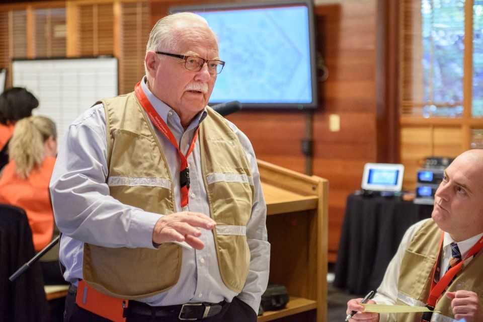 Larry Gibbs participates in an earthquake preparedness drill in 2016.