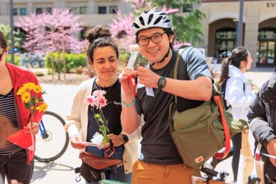 Student holding up a souvenir.