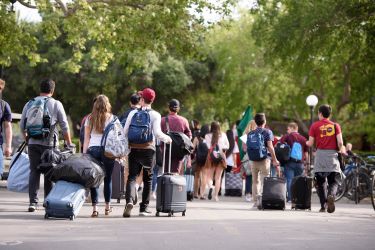 ProFros make their way across White Plaza to their dorm