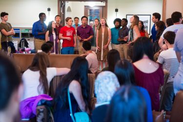 Talisman a cappella performs for admits in Norcliffe Hall