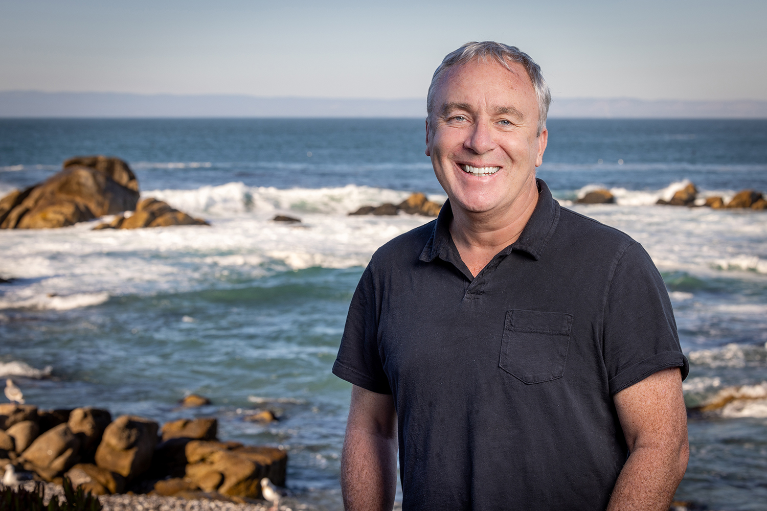 Chris Lowe with Monterey Bay in background