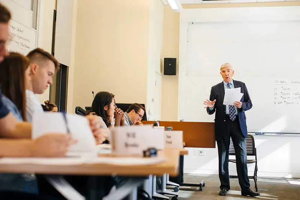 Image of H. Irving Grousbeck teaching GSB students at the the Center for Entrepreneurial Studies.