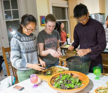 students make salad at Roble Hall