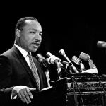 Martin Luther King Jr. at lectern in Stanford's Memorial Auditorium, April 14, 1967