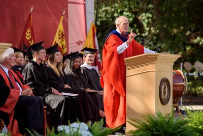 John Hennessy speaking at podium