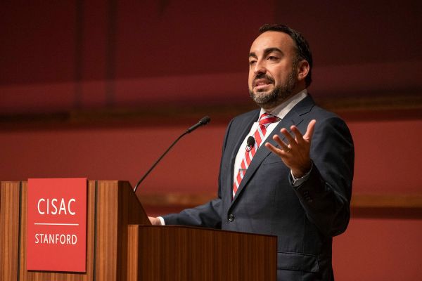 Alex Stamos speaking at a podium