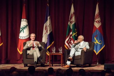 President Marc Tessier-Lavigne and Vice President Harry Elam onstage at Memorial Auditorium