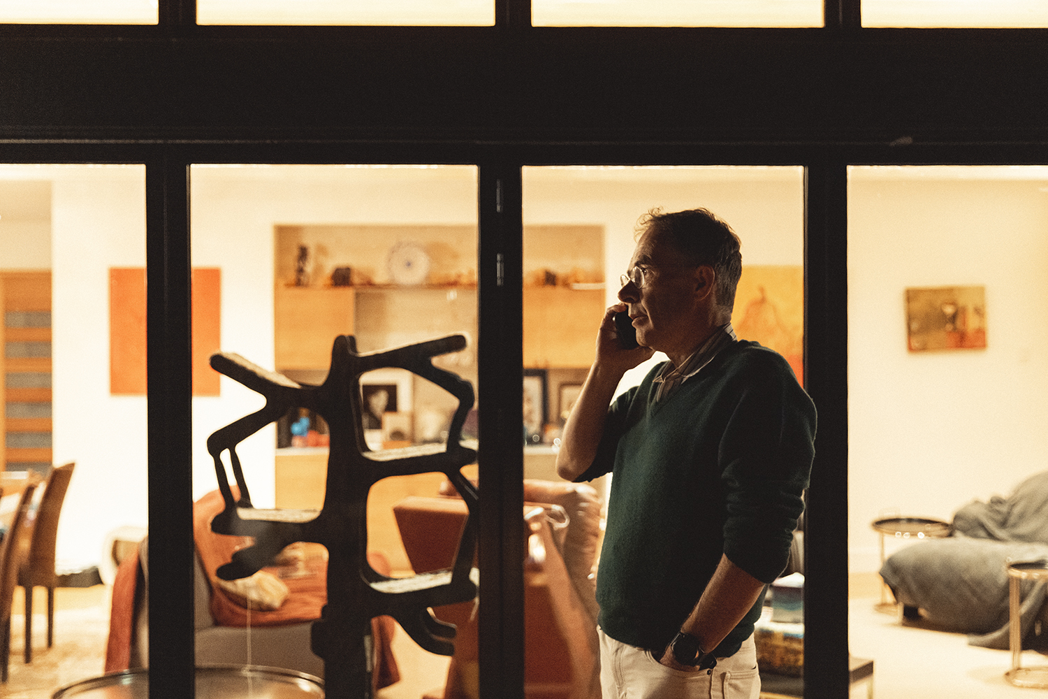 Guido W. Imbens talks on the phone in the early morning hours after announcement that he won the Nobel Prize.