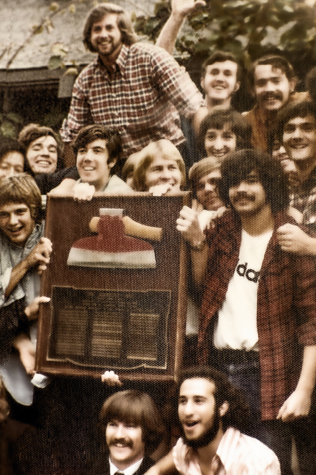 Students holding up the Axe.