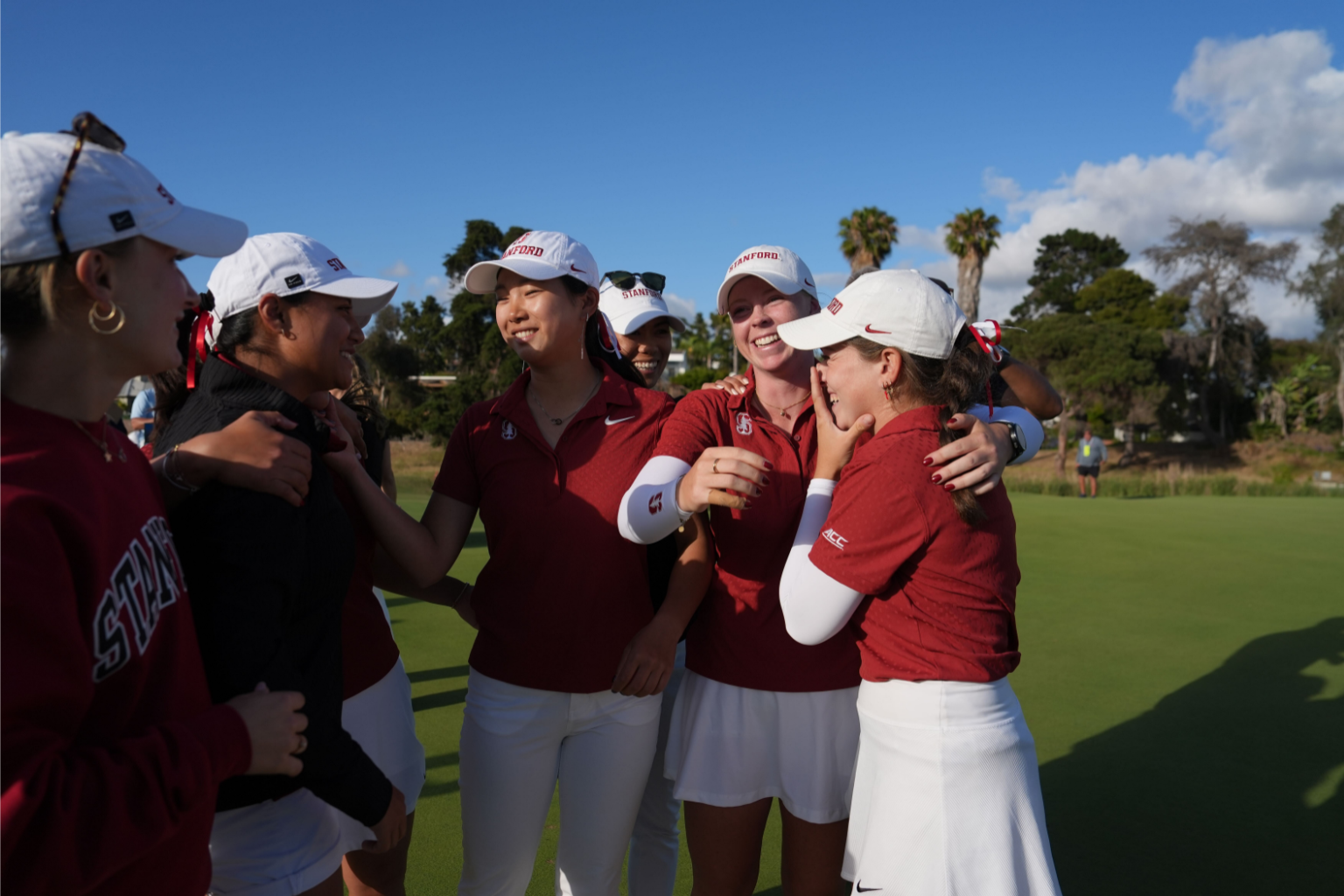 Women's golf players celebrate after winning the NCAA championship